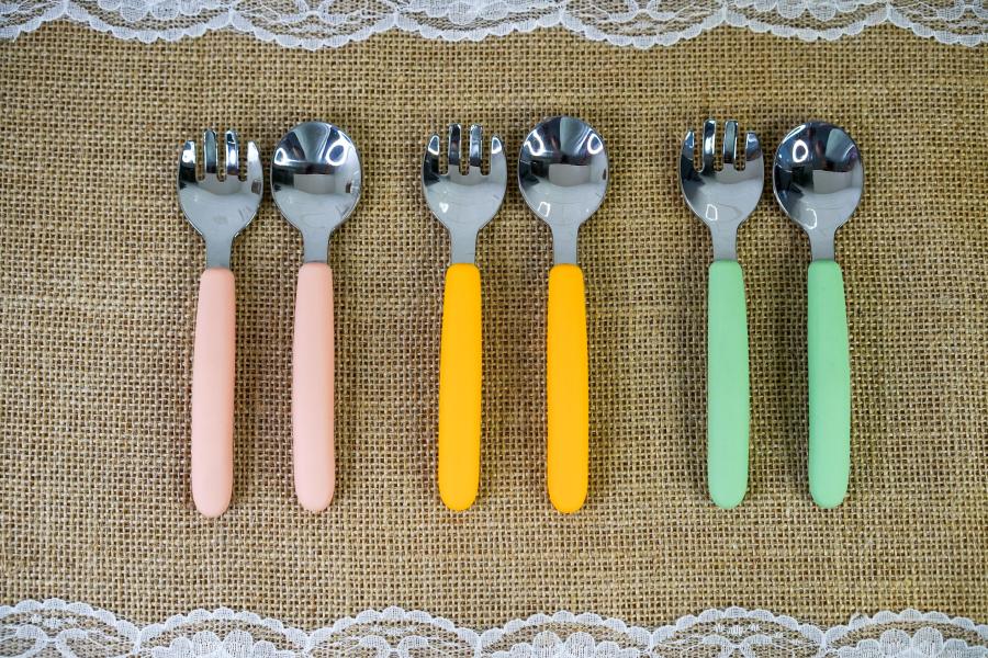 Stainless steel and silicone 13.5cm cutlery set (fork and spoon). Available in Pink, Yellow and Green.